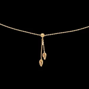 Gold necklace with two hibiscus flowers and a hummingbird